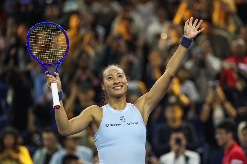 Zheng Qinwen celebrates after winning her women’s singles match against Emiliana Arango at the China Open. Photo: EPA