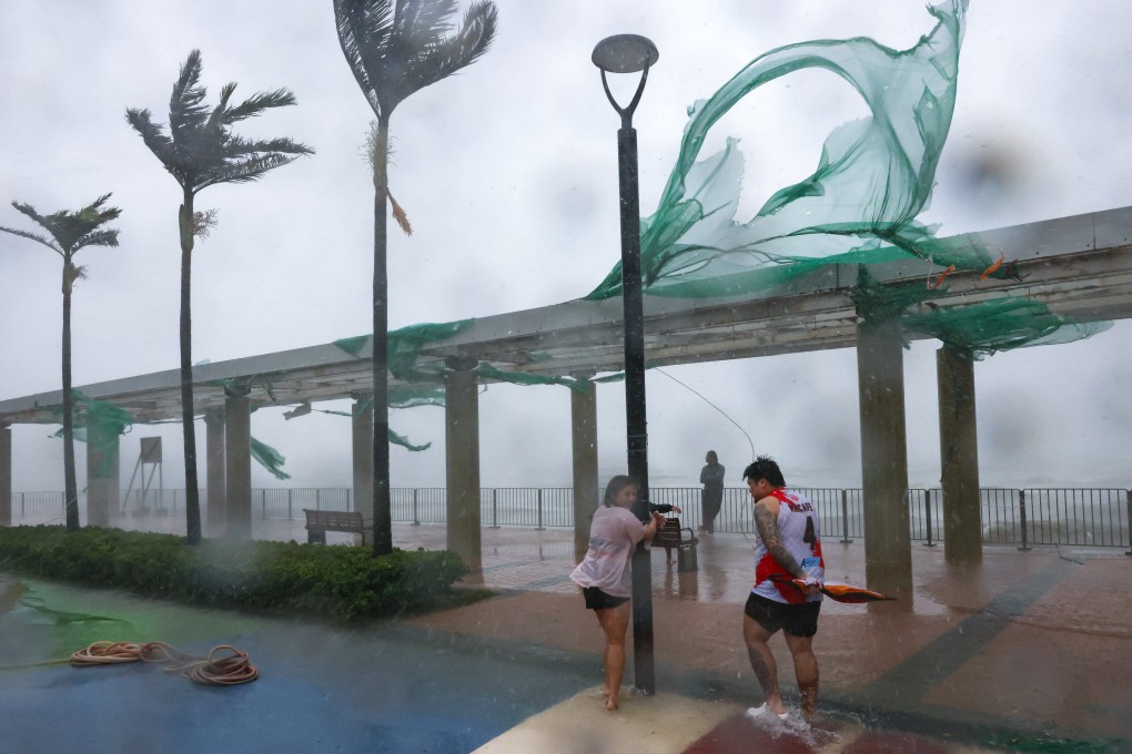 Dozens of residents ignored government warnings and gathered to watch the waves during Ragasa. Photo: Nora Tam