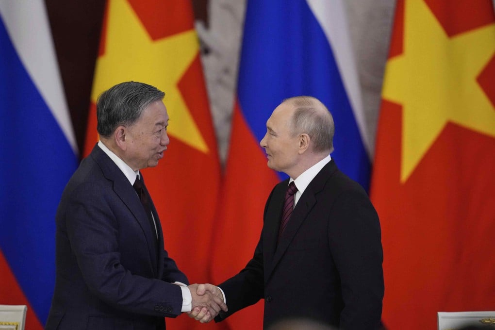 Russian President Vladimir Putin and To Lam, General Secretary of the Central Committee of the Communist Party of Vietnam, shake hands after a signing ceremony at the Kremlin in Moscow on May 10. Photo: AP