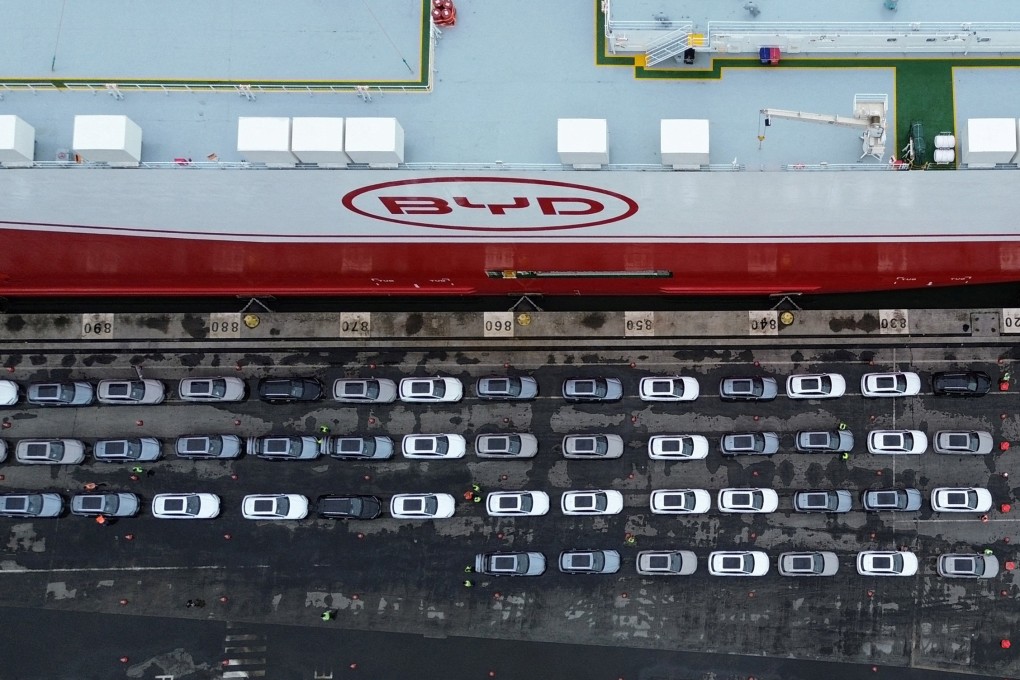 BYD cars sit alongside one of the company’s ships at the Itajai port in Santa Catarina, Brazil, on May 28, 2025. Photo: Reuters
