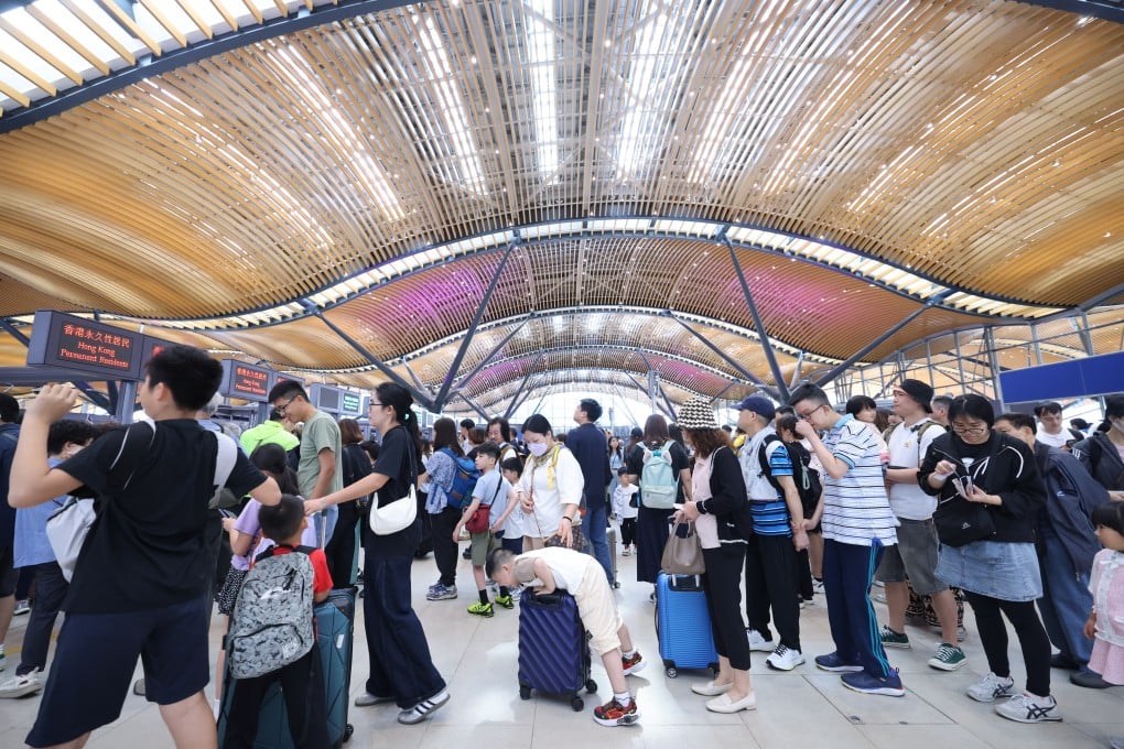 Travellers at the Hong Kong-Zhuhai-Macau bridge clearance building for outbound travel on the first day of the Easter holiday. Photo: Nora Tam