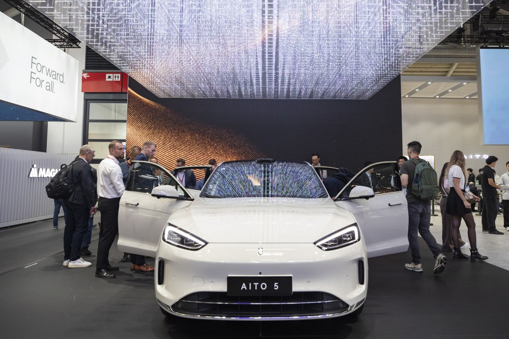 People look at an electric vehicle from Chinese brand Aito at the 2025 IAA Mobility trade fair in Munich on September 10, 2025. Photo: Xinhua