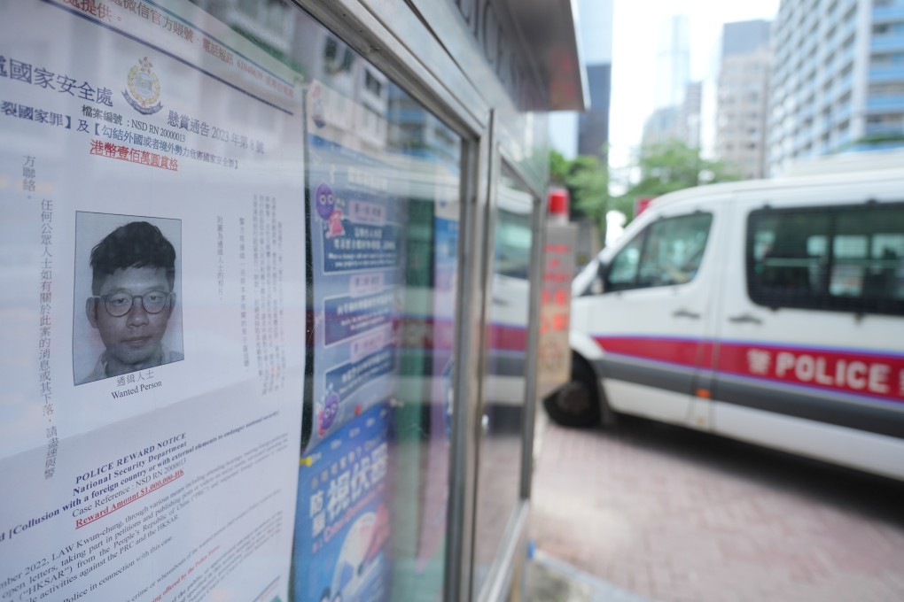 A “wanted person” poster for Nathan Law on display outside Tsim Sha Tsui Police Station. Photo: Sam Tsang