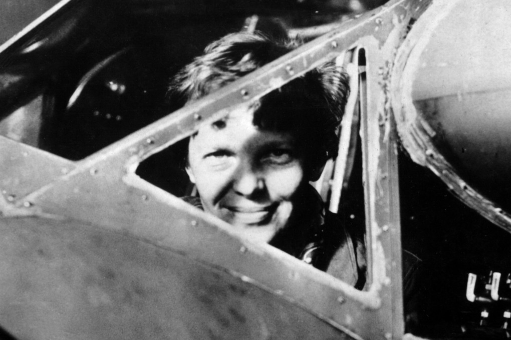 American aviator Amelia Earhart looks through the cockpit window of her plane in this undated file photograph. Photo: AFP