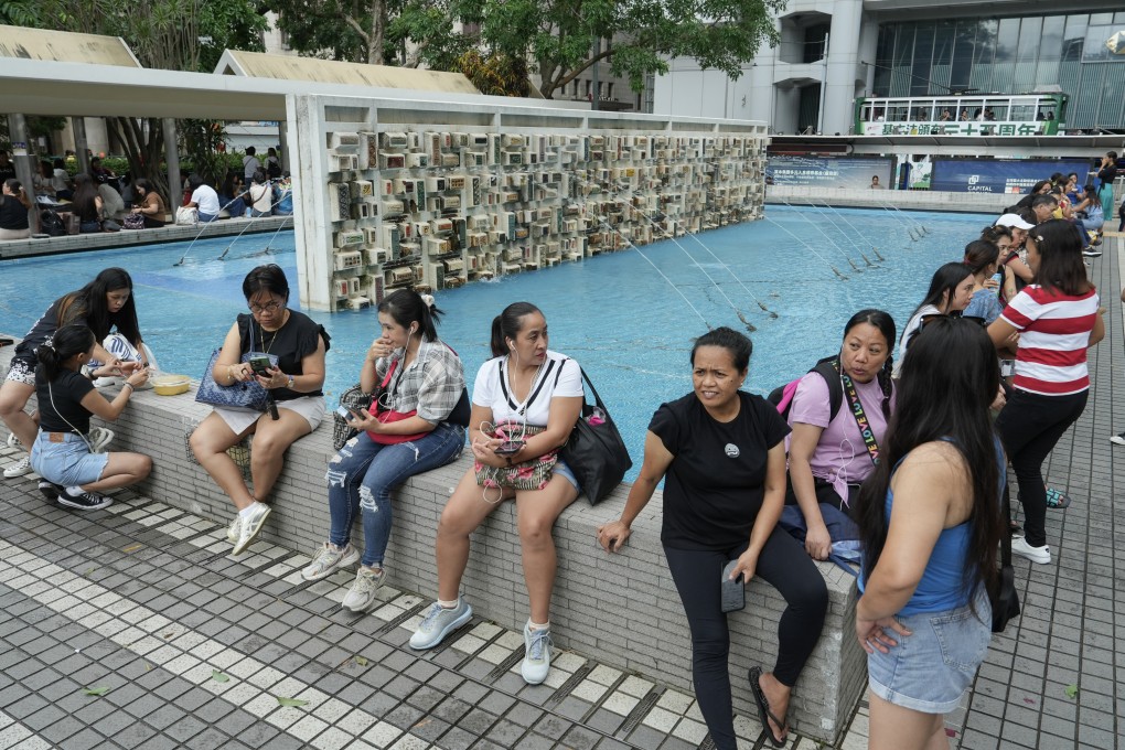 Foreign domestic helpers spend their day off in Central. Photo: Sun Yeung