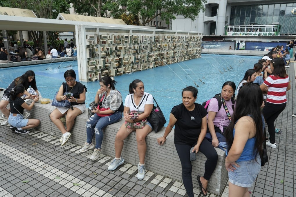 Foreign domestic helpers spend their day off in Central. Photo: Sun Yeung