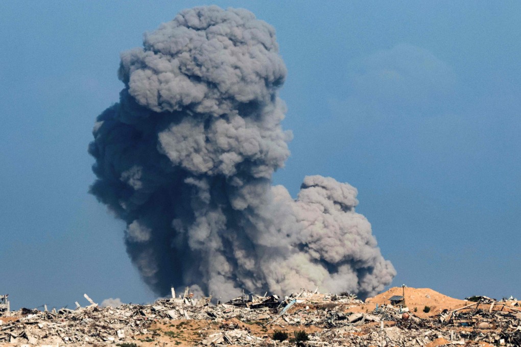 A smoke plume billows following Israeli bombardment on the Gaza Strip on Tuesday. Photo: AFP
