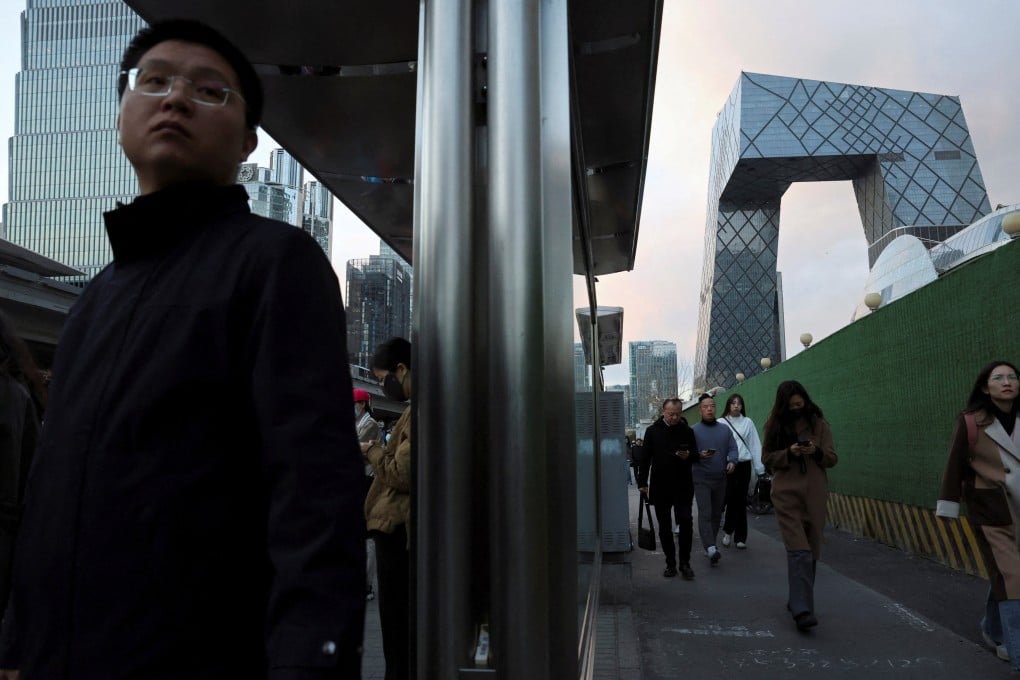 Commuters wait at a bus stop during evening rush hour at the central business district in Beijing on March 2. The Politburo has set a date for the party’s fourth plenum, during which its leaders will introduce the 15th five-year plan. Photo: Reuters