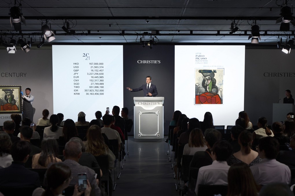 Rahul Kadakia, Christie’s incoming Asia-Pacific president, stands at the rostrum during the sale of Pablo Picasso’s Buste de femme (1944) on September 26, 2025. The painting, which sold for HK$197 million, set an auction record for a Picasso piece in Asia. Photo: Christie’s