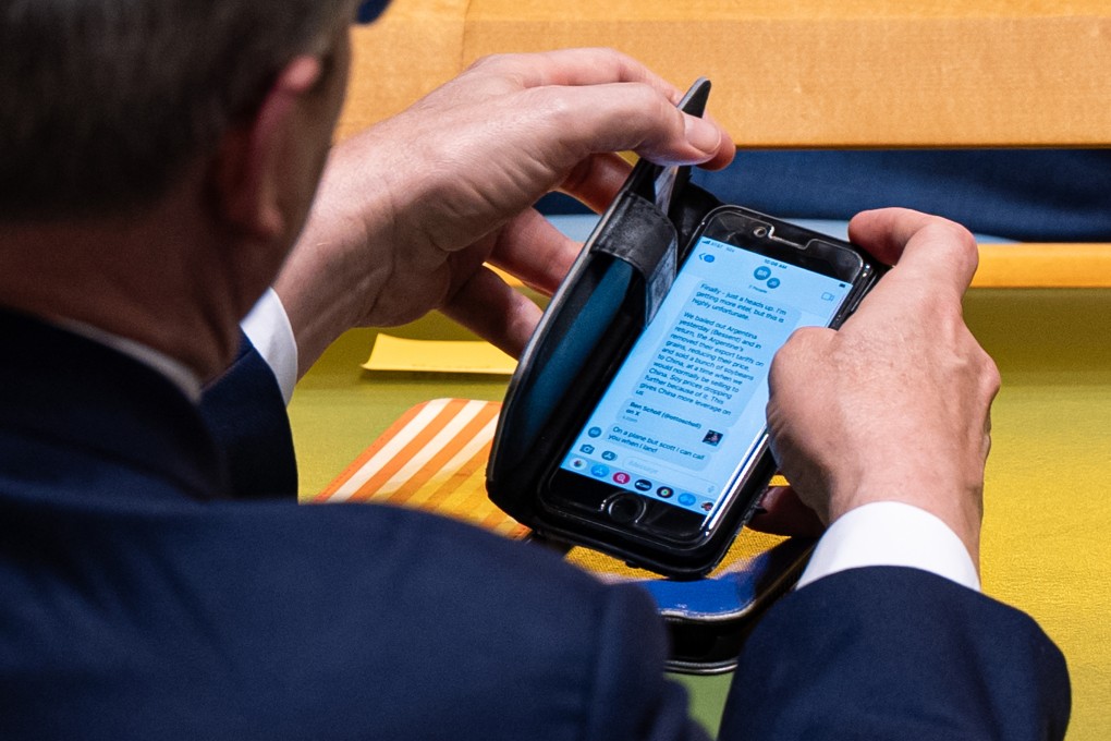 US Treasury Secretary Scott Bessent checks a text message regarding Argentina’s relations with the US during the 80th session of the United Nations General Assembly in New York last week. Photo: AP