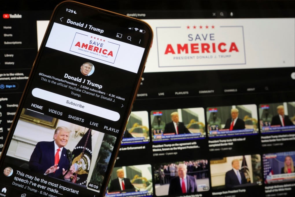 Donald Trump’s YouTube account is seen on a mobile phone and laptop in 2023 after being restored after Google lifted a suspension imposed on Trump after the January 6, 2021 Capitol riot. Photo: Reuters