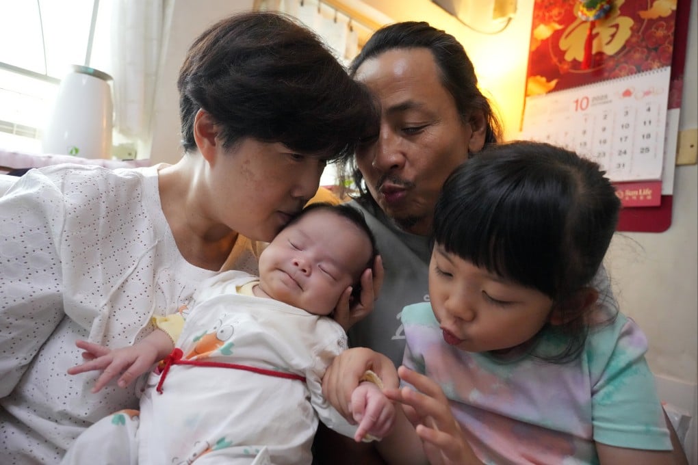 Lilian Chan at her home in Tuen Mun with her husband Brian Wong, six-year-old Miracle and baby Gia. Photo: May Tse