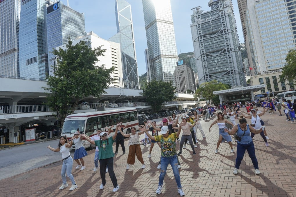 A group of domestic helpers dance in Central on July 27. Photo: Sun Yeung