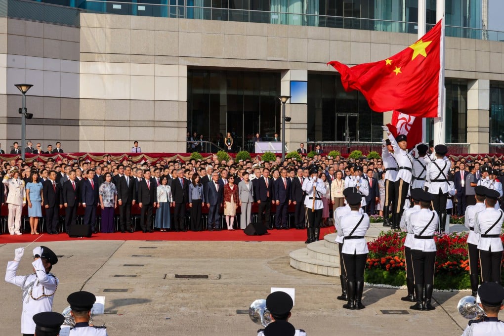 Chief Executive John Lee and top government officials attend a flag-raising ceremony in Golden Bauhinia Square in Wan Chai. Photo: Nora Tam