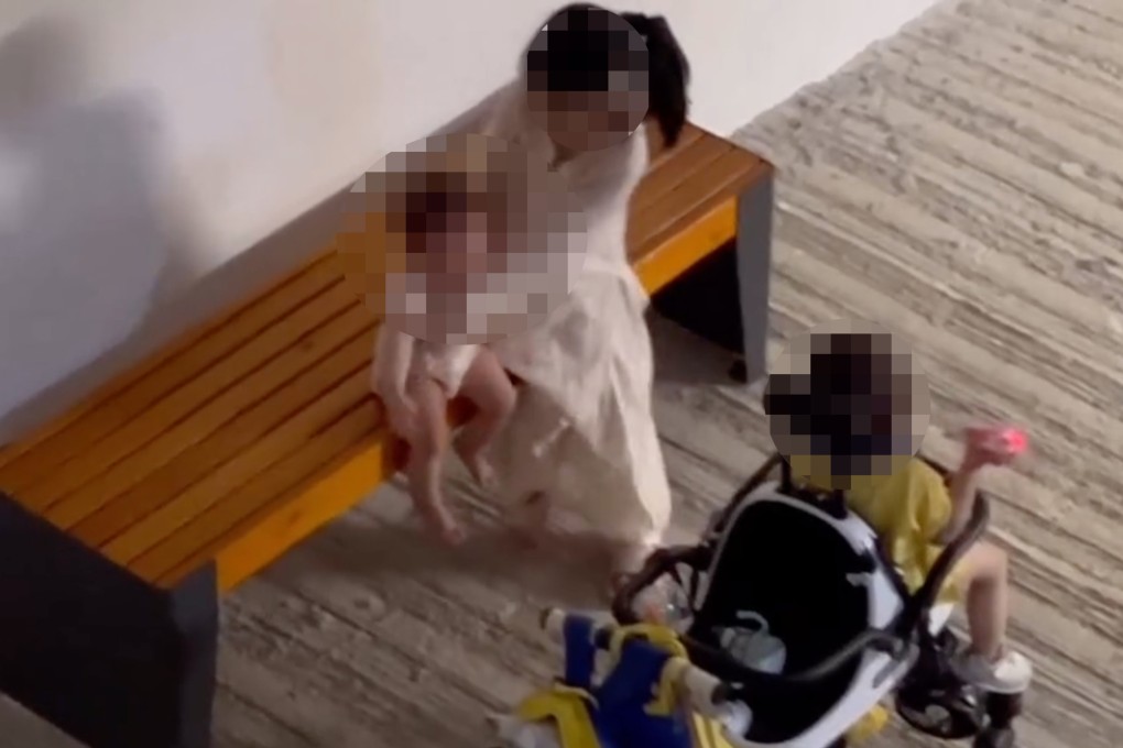 In the video recorded and posted on social media by a resident, the girl is seen twice pushing the crying 11-month-old off a bench. Photo: Handout