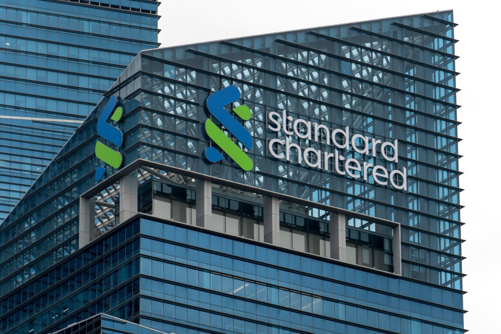 The Standard Chartered logo is seen on its office tower in Singapore’s Marina Bay Financial Centre. Photo: Harvey Kong