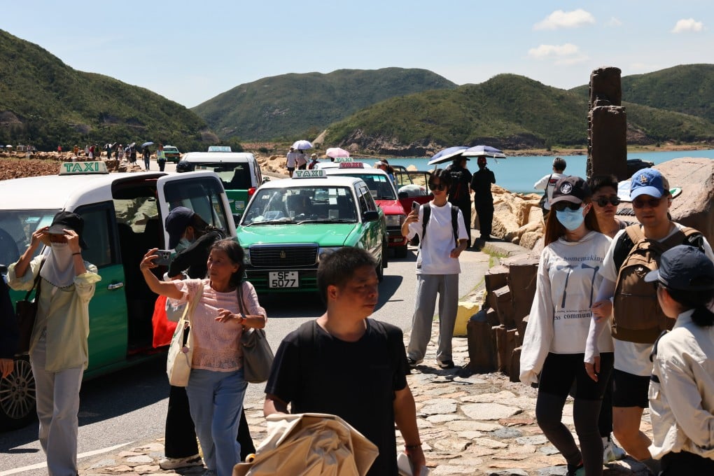 Visitors at Sai Kung’s High Island Reservoir on the first day of the National Day ‘golden week’ holiday. Photo: Dickson Lee