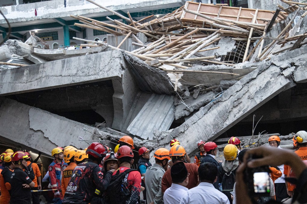 Rescuers search for survivors in the rubble of a collapsed building at Al Khoziny Islamic Boarding School in Sidoarjo on Tuesday. Photo: Getty Images/TNS