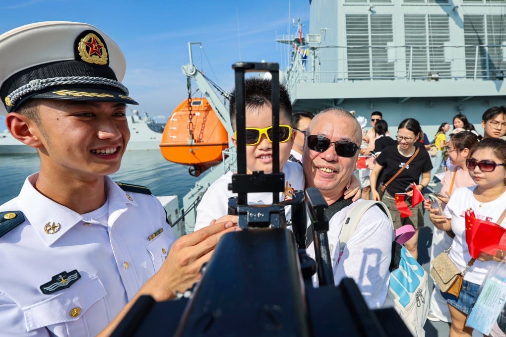 Visitors tour the Qi Jiguang at Stonecutters Island on Wednesday. Photo: Karma Lo