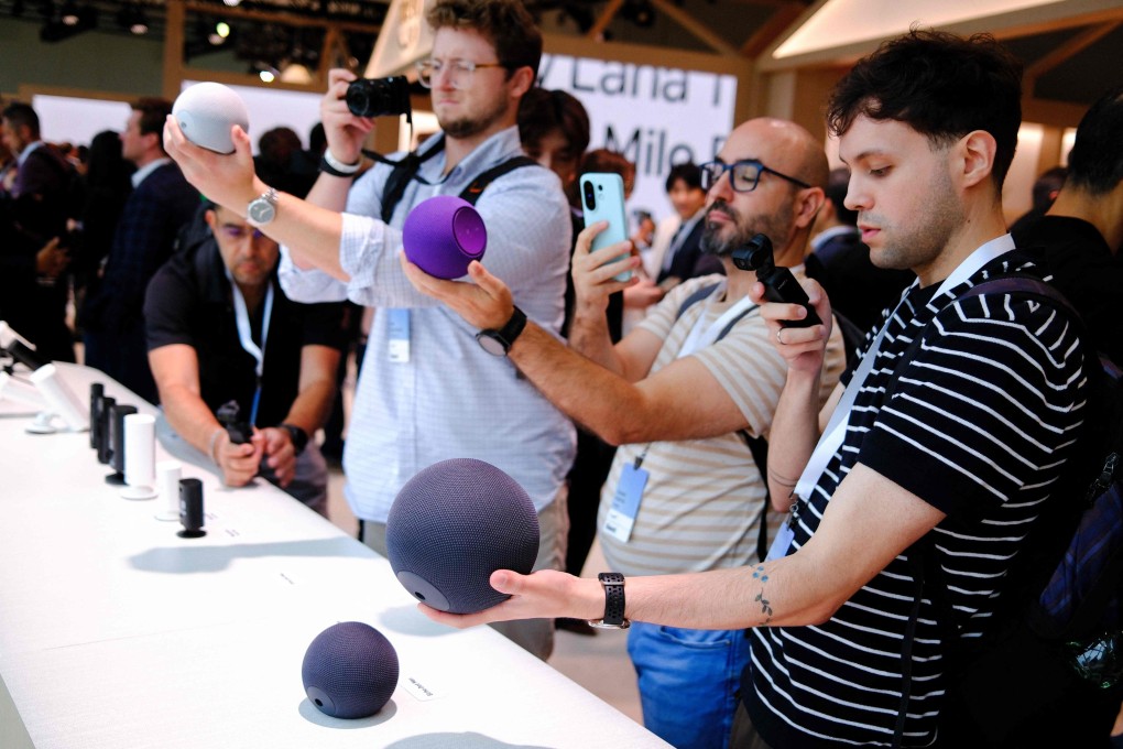 Guests take pictures of Amazon Echo smart speakers during an Amazon product event in New York on September 30, 2025, at which Amazon announced its next generation of Kindle, Ring, Blink, Fire TV and Echo devices. Photo: AFP