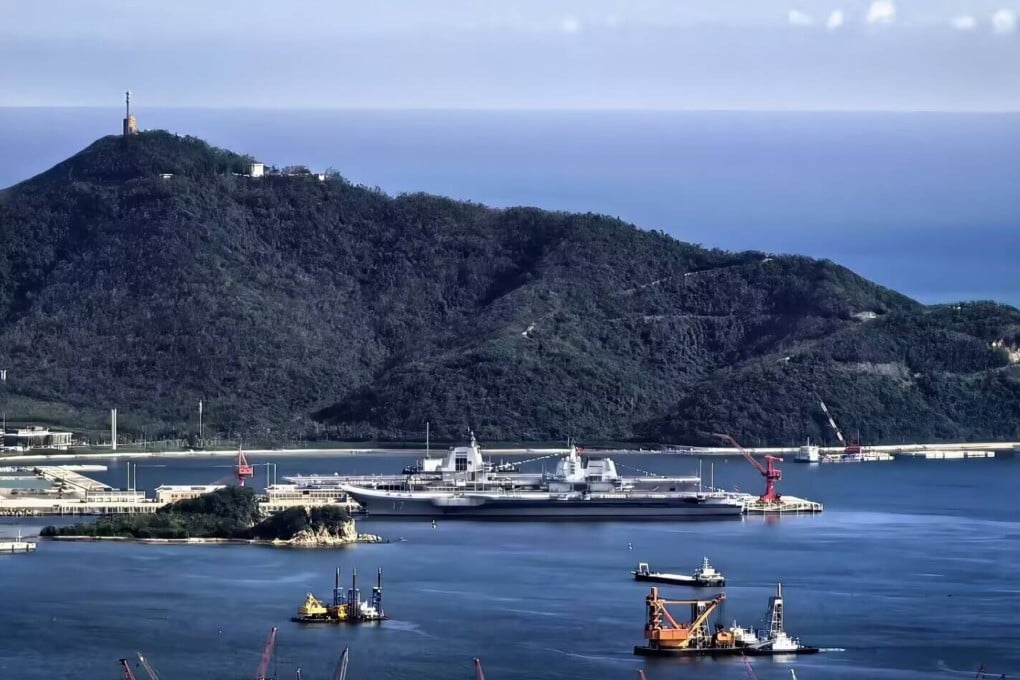 The Shandong in the foreground is berthed next to the Fujian at a base in Sanya, Hainan province. Photo: X/ RupprechtDeino