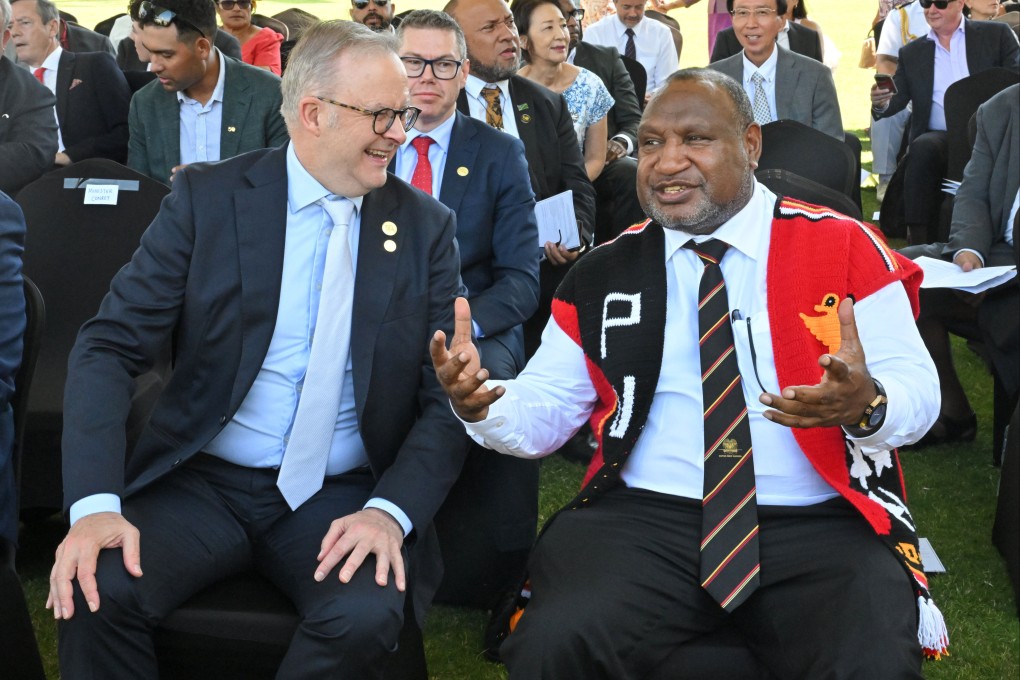 Australia’s Prime Minister Anthony Albanese (left) and Papua New Guinea’s Prime Minister James Marape attend a flag lowering ceremony in Port Moresby, Papua New Guinea, on September 16. Photo: AP