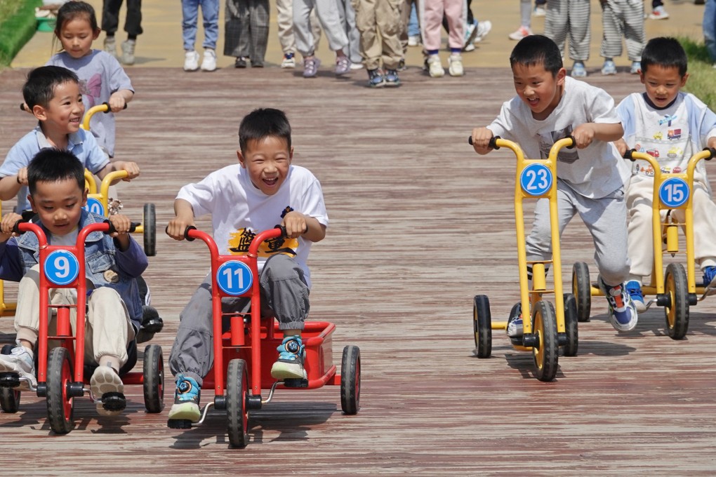 Children take part in a bicycle race at the Second Experimental Kindergarten in Yantai High-tech Zone, Shandong province in 2024. Photo: CFOTO / Future Publishing via Getty Images