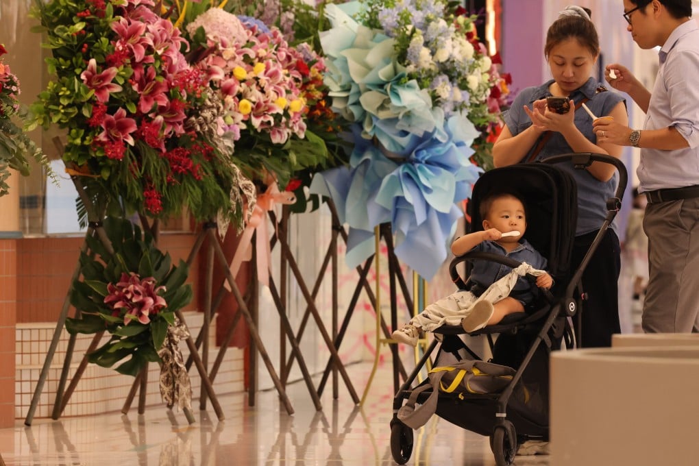 Parents with with their child in a shopping mall in Tsim Sha Tsui on September 19. Photo: Jelly Tse
