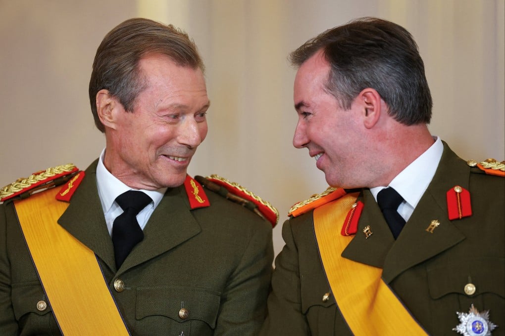 Luxembourg’s Grand Duke Henri and his son, Guillaume, during Henri’s abdication ceremony. Photo: Reuters
