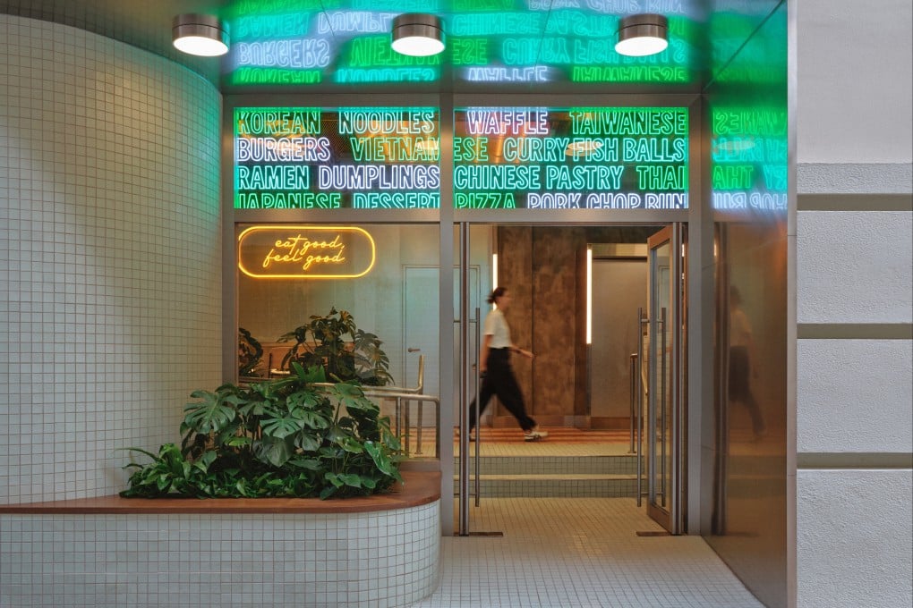 Modern neon above the new main entrance of
Kam Pek Market in Macau. Photo: Jonathan Leijonhufvud