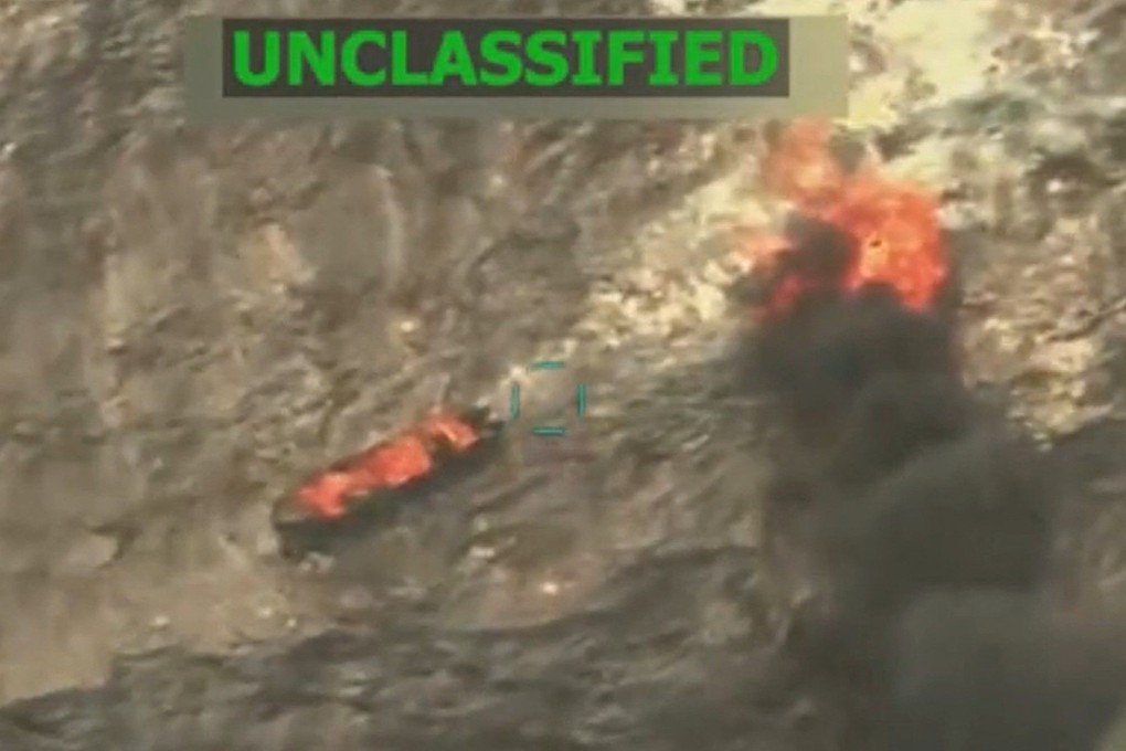 An image from a video posted online by US President Donald Trump shows what he says is a US military strike on a boat carrying alleged drug traffickers in the Caribbean in September. Photo: Truth Social/realDonaldTrump via AFP