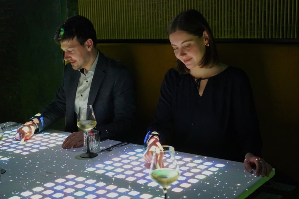 Diners take part in The Magic Table, a magical dining experience created by The Clairvoyants at the Grand Hyatt Hong Kong. Photo: Grand Hyatt Hong Kong