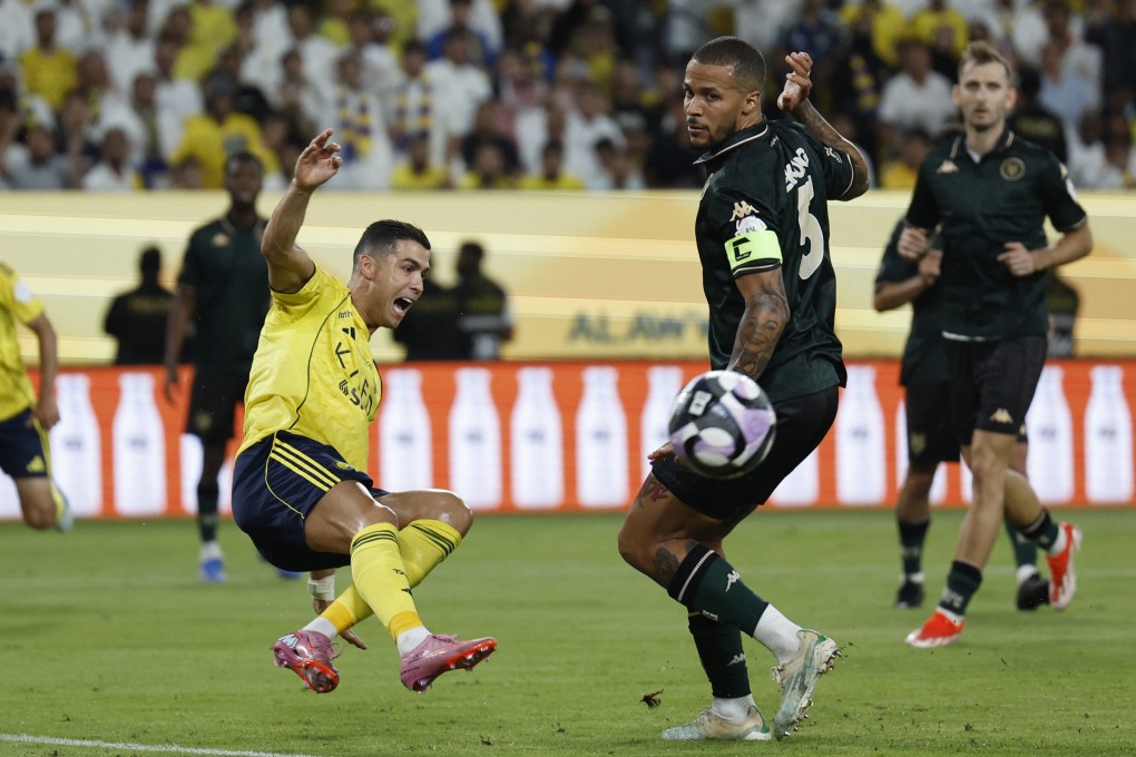 Al-Kholood’s William Troost-Ekong (right) tussles with Al-Nassr’s Portuguese forward Cristiano Ronaldo, one of the Saudi Pro League’s biggest stars. Photo: Reuters
