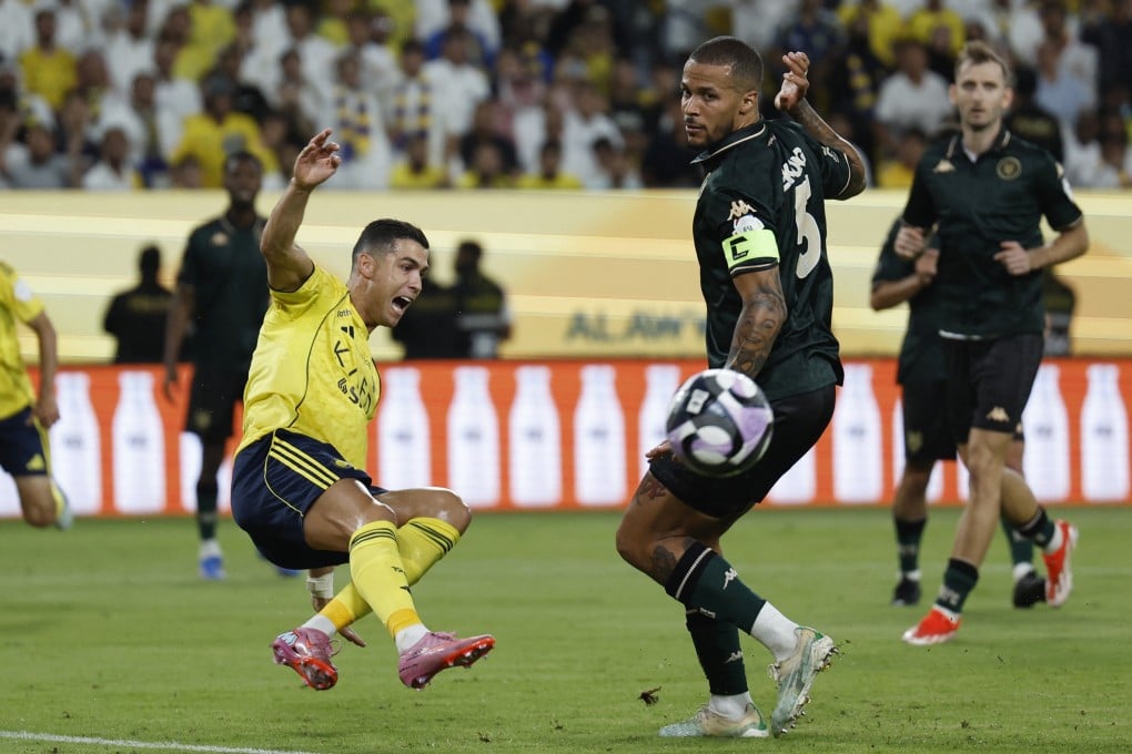 Al-Kholood’s William Troost-Ekong (right) tussles with Al-Nassr’s Portuguese forward Cristiano Ronaldo, one of the Saudi Pro League’s biggest stars. Photo: Reuters