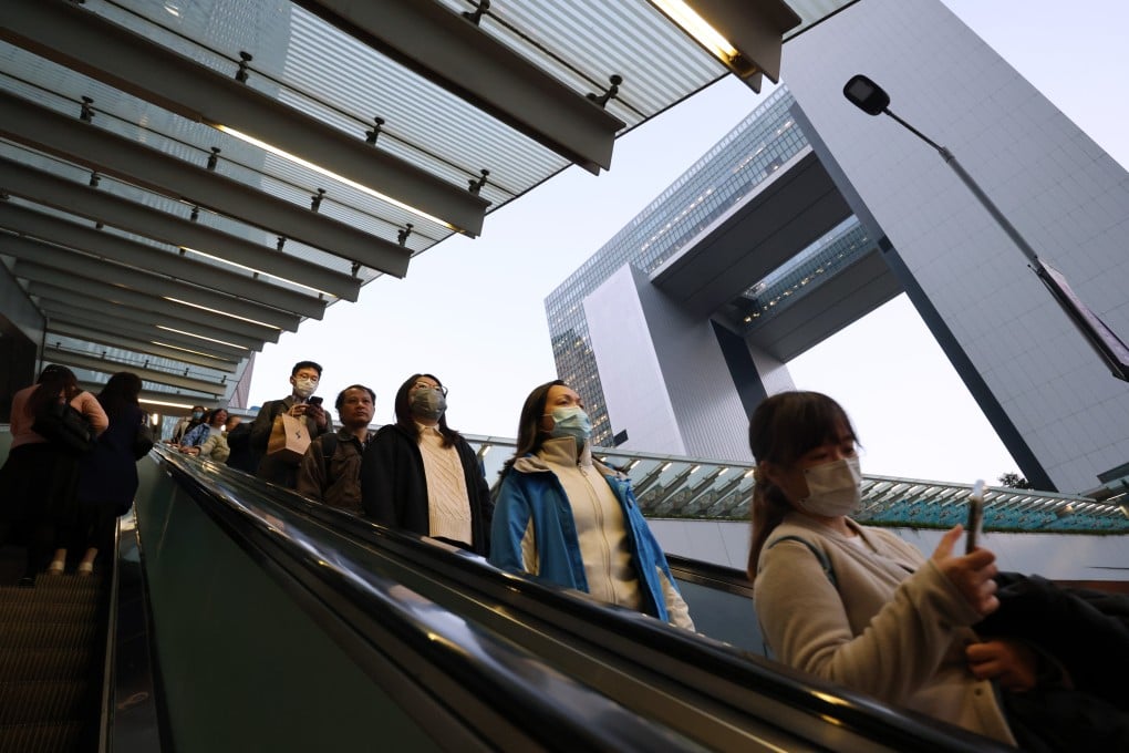 People ride the escalators at Hong Kong’s government offices in Tamar on January 6. Photo: Jelly Tse