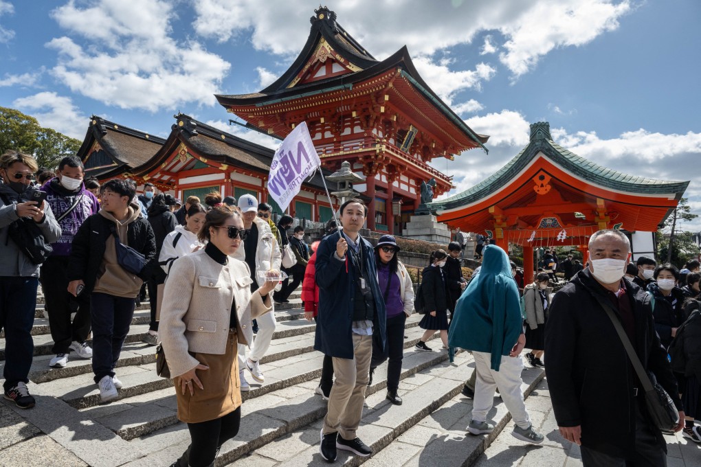 Tourists visit Fushimi Inari shrine in Kyoto, Japan, last year. Photo: AFP