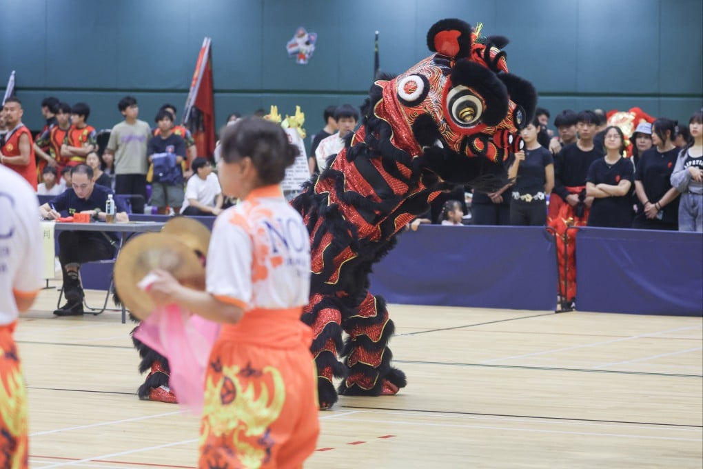 Young people take part in a lion dance competition at Yuen Wo Road Sports Centre, Sha Tin, on June 29. Photo: Edmond So