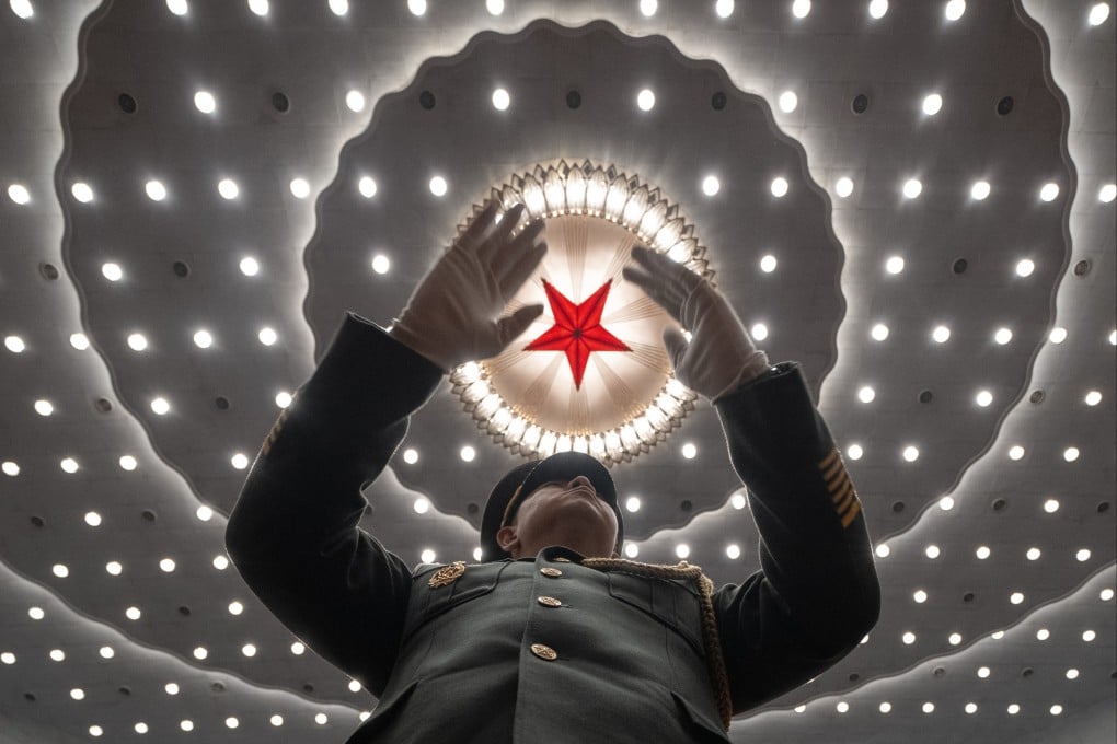 A Chinese military band conductor in action at the closing ceremony of the National People’s Congress, in Beijing on March 11. Several senior members of the military have been ensnared in the anti-corruption drive spearheaded by President Xi Jinping. Photo: AP