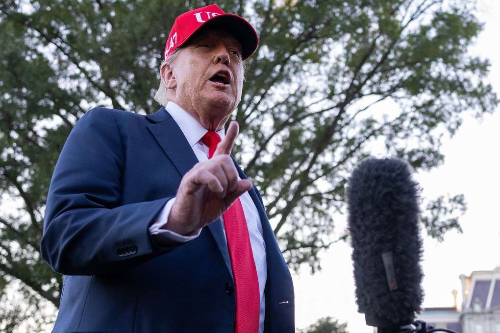 US President Donald Trump talks to the media  on the South Lawn of the White House on Sunday. Photo: Getty Images/TNS