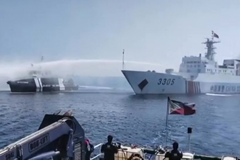 A Chinese Coast Guard ship uses a water cannon on a Philippine Bureau of Fisheries and Aquatic Resources vessel near Scarborough Shoal in the disputed South China Sea. Photo: AFP