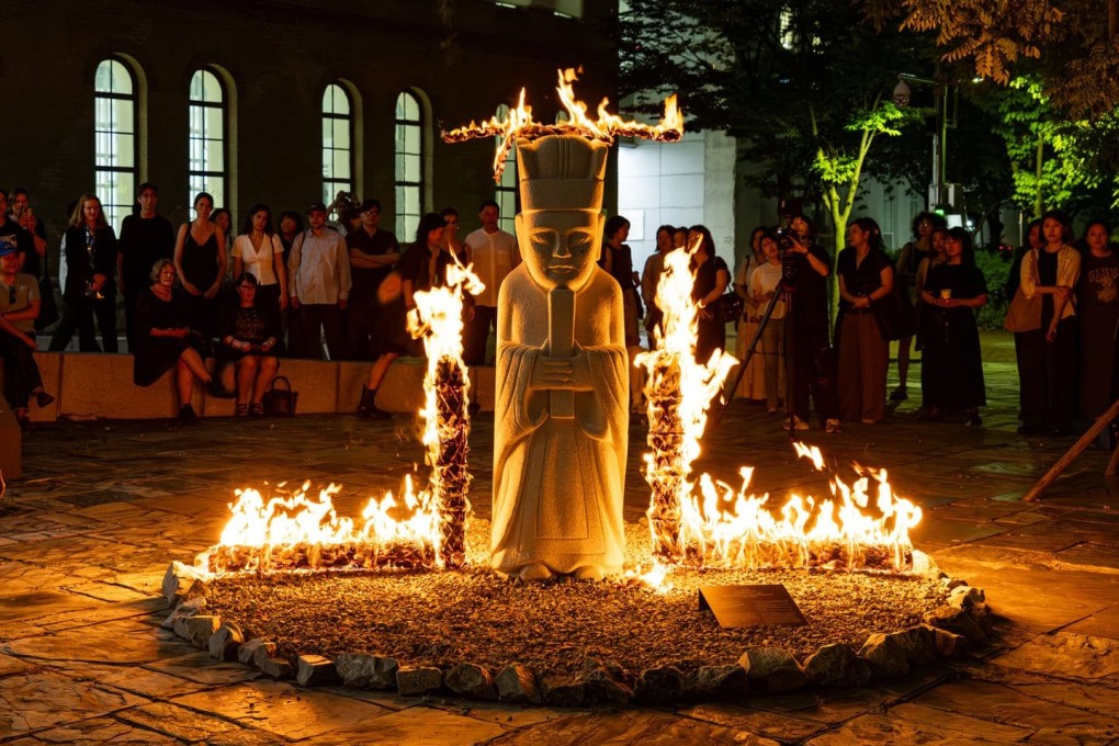 A reenactment of the Burning Performance 1989/2025, by Seung-taek Lee, is seen at the 13th Seoul Mediacity Biennale at the Seoul Museum of Art, in South Korea. Photo: Hong Cheolki