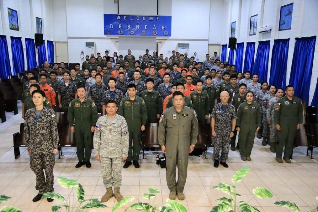 Personnel from the Philippine Air Force and the Japan Air Self-Defence Force attend a ceremony in Lapu-Lapu City on Wednesday to mark the launch of their joint mission to help quake-hit Cebu. Photo: Instagram/philairforce