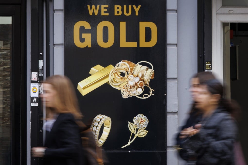 People walk past jewellery shops and gold dealers in Hatton Garden, London, Britain, on October 8. Photo: EPA
