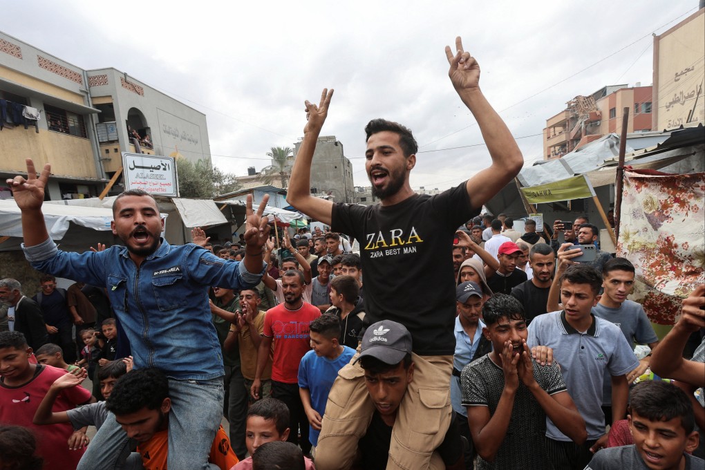 Palestinians in Khan Younis on Thursday celebrate, after US President Donald Trump announced that Israel and Hamas agreed on the first phase of a Gaza ceasefire. Photo: Reuters