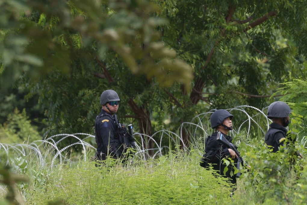 Thai rangers patrol along the country’s border with Cambodia at Ban Nong Ya Kaeo in Sa Kaeo province last month. Photo: EPA