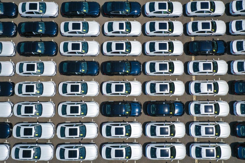 Newly-produced BMW cars are parked outside a factory in Shenyang, northeastern China. European auto manufacturers have been hit hard by EU steel tariffs. Photo: AFP