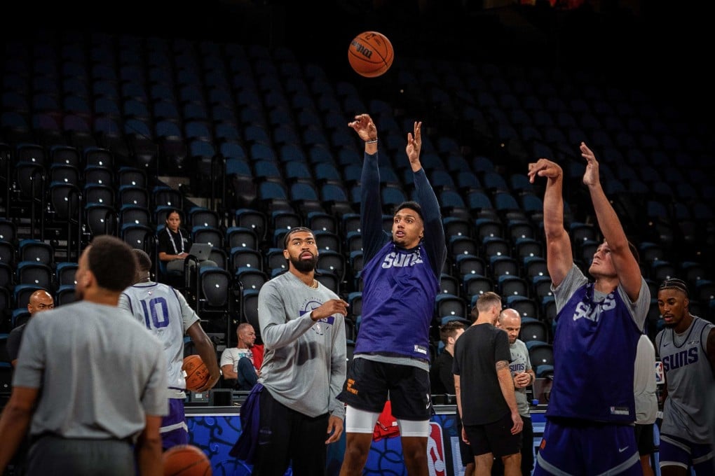 Phoenix Suns players practise shooting at the Venetian Arena in Macau on Thursday. Photo: AFP