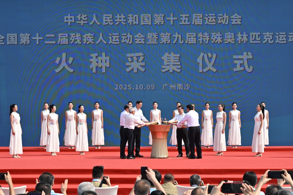Hong Kong Chief Executive John Lee (front row, second right) takes part in the flame lighting ceremony in Guangzhou. Photo: ISD