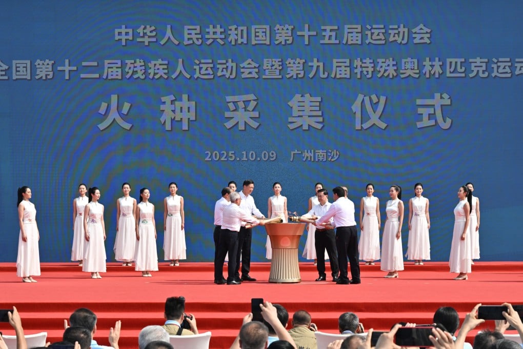 Hong Kong Chief Executive John Lee (front row, second right) takes part in the flame lighting ceremony in Guangzhou. Photo: ISD