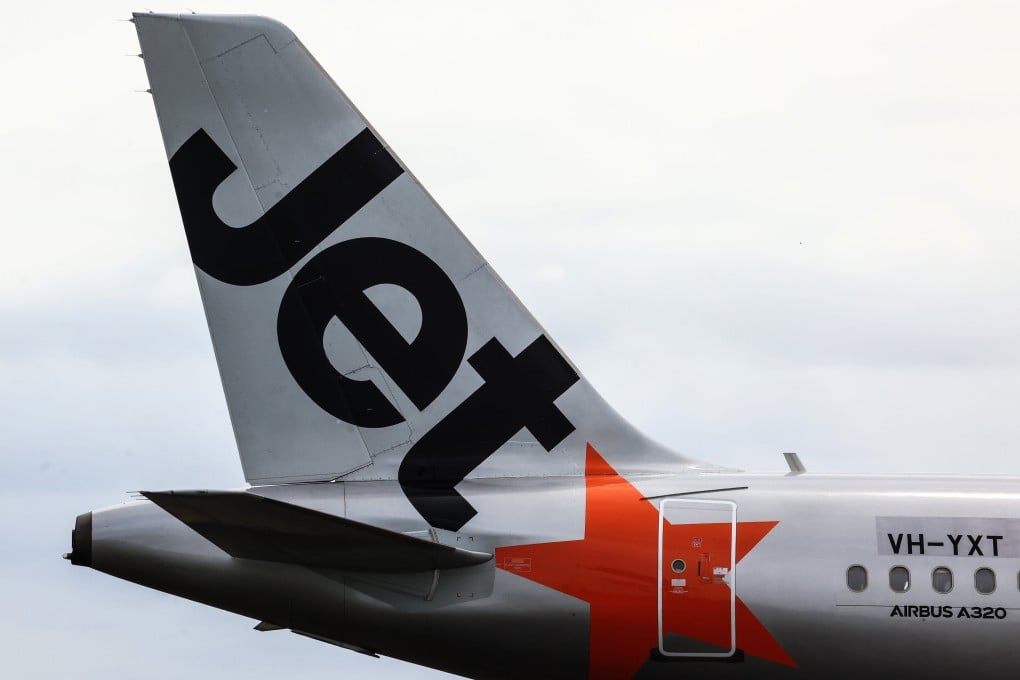 A Jetstar aircraft at Sydney Airport. The Qantas Group-owned carrier says it is investigating an incident involving one of its planes moving on a runway at the airport with an open cargo door. Photo: Getty Images